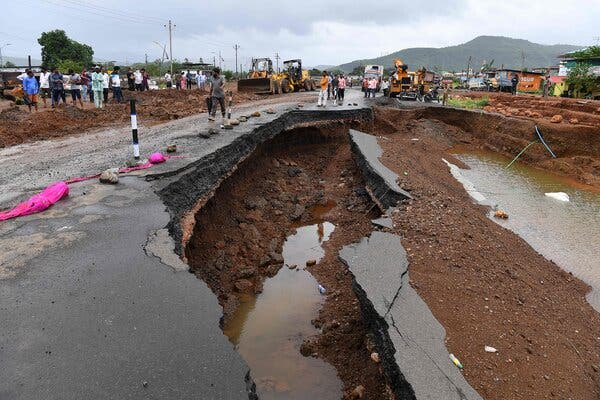 A section of highway partly collapsed after heavy rain in Mahad, in the state of Maharashtra, on Saturday. 