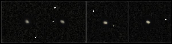 Four views captured by the European Southern Observatory’s Very Large Telescope in Chile of the asteroid 130 Elektra and two of its satellites. Another team of astronomers say they detected a third.