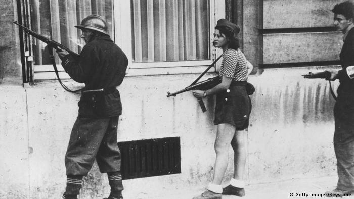 Armed fighters on guard during the liberation of Paris in late August 1944