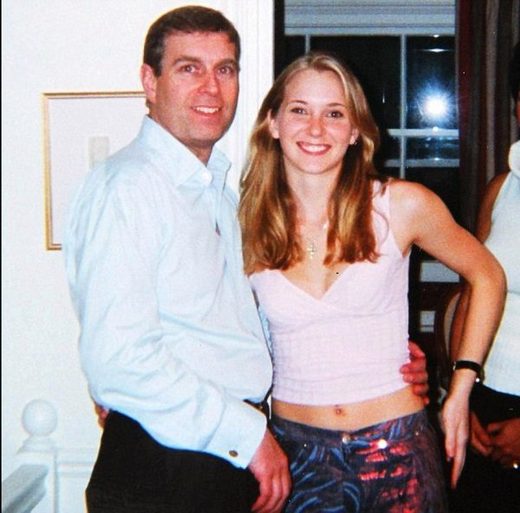 Prince Andrew poses with Virginia Roberts