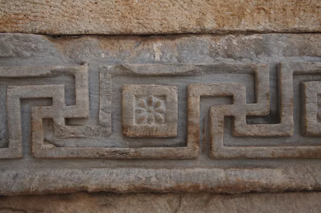 turkey--near-selcuk--ephesus--the-temple-of-hadrian--carved-swastika-patterns-110057601-5c4bdaf246e0fb0001a8e6ff.jpg